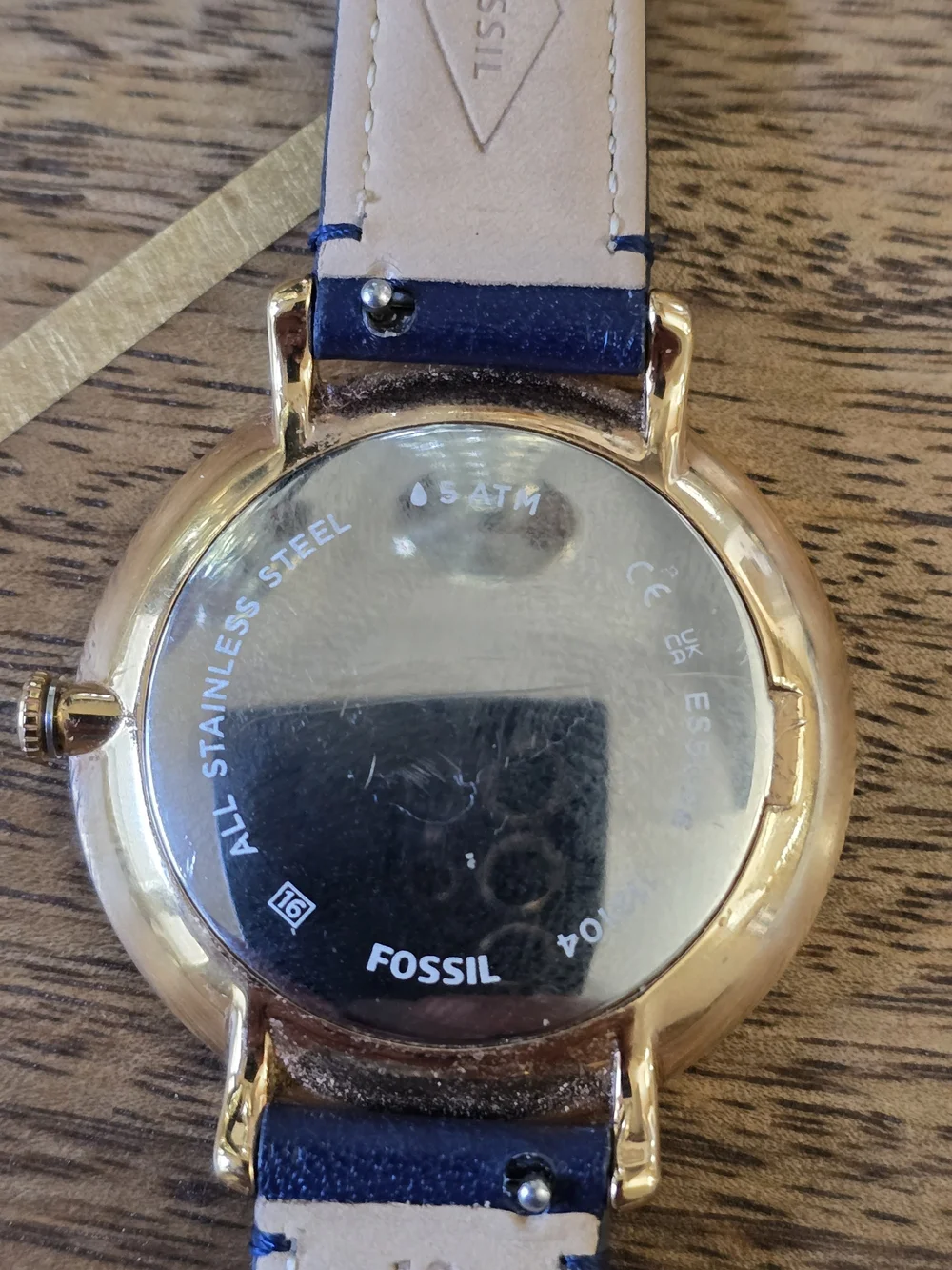Fossil Gold-Tone Case Watch with White Dial and Black Leather Strap